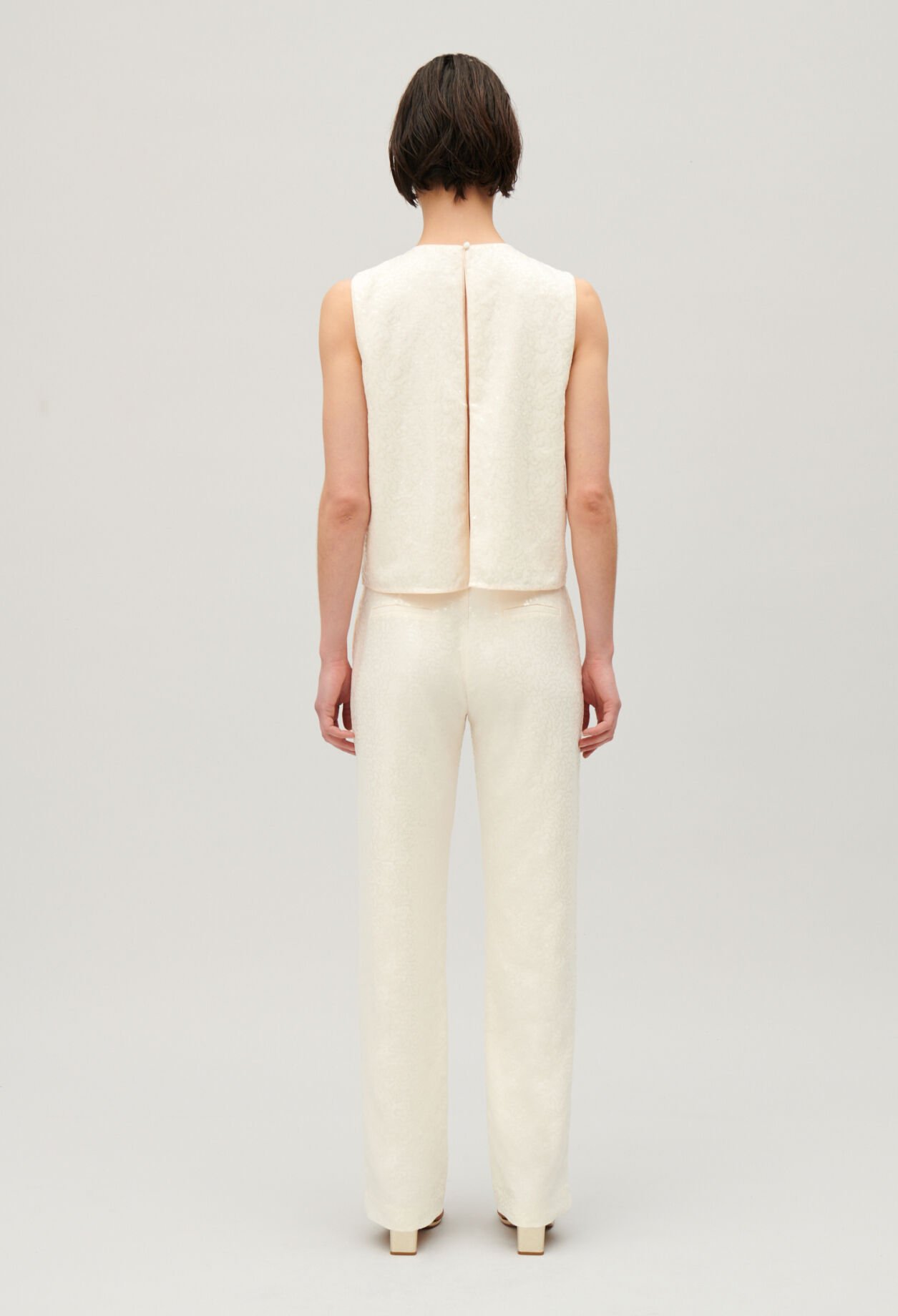 Hose mit Paillettenbesatz Ecru