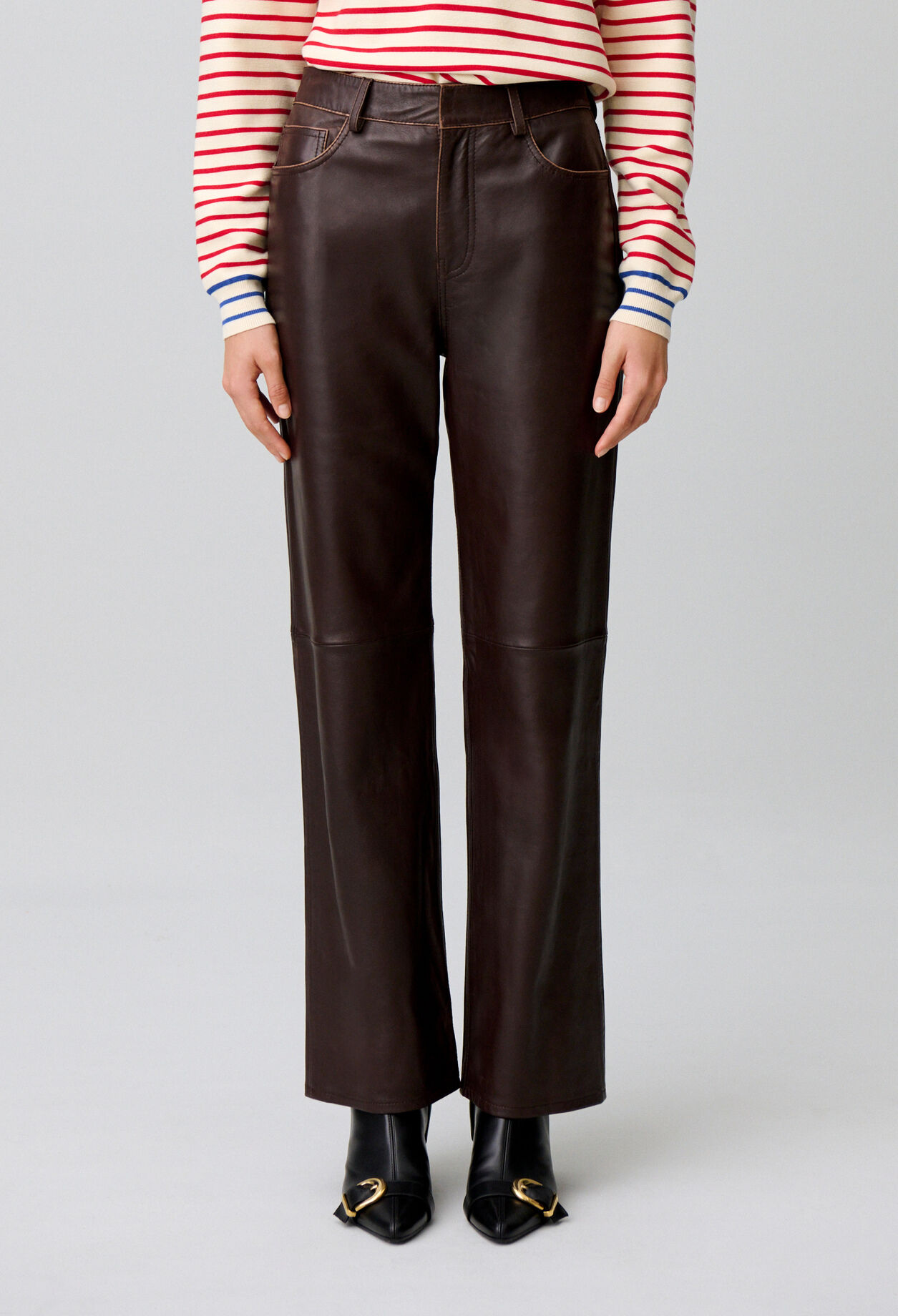 Gerade Lederhose mit Goldknopf