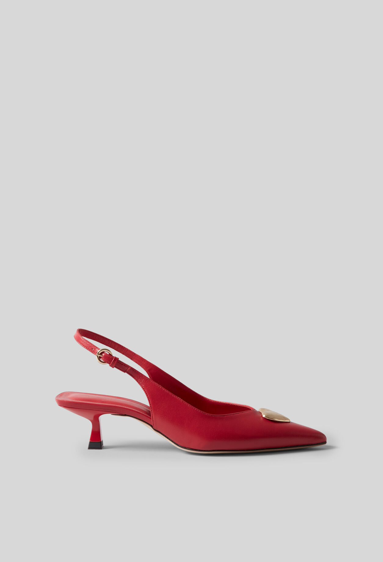 Pumps mit goldenem Herz