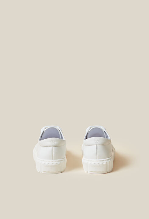 Weiße Ledertennisschuhe