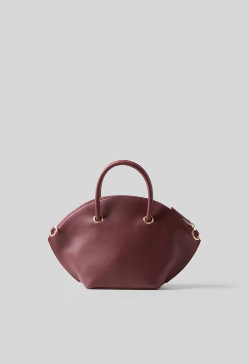 Glattledertasche mit Goldringen