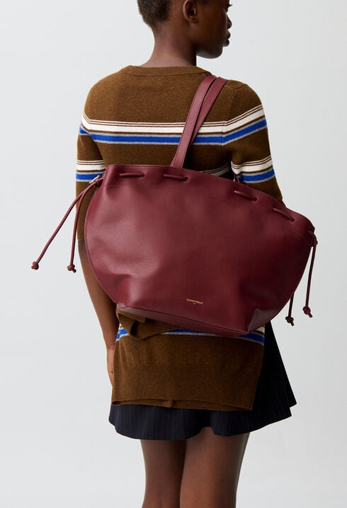 Glattledertasche mit Goldringen
