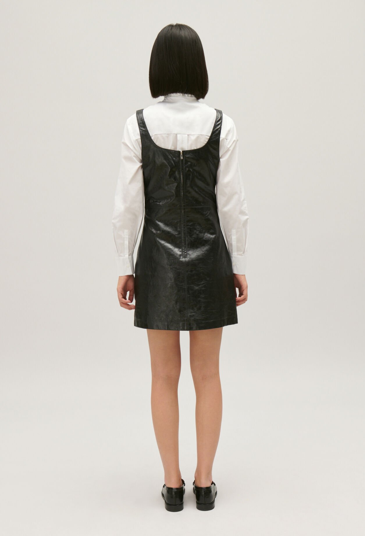 Kurzes Chasuble Kleid schwarzes Leder