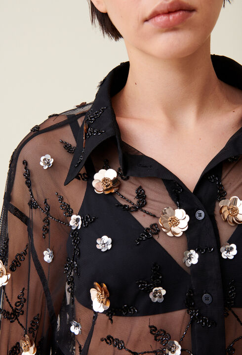 Schwarze transparente Stickbluse