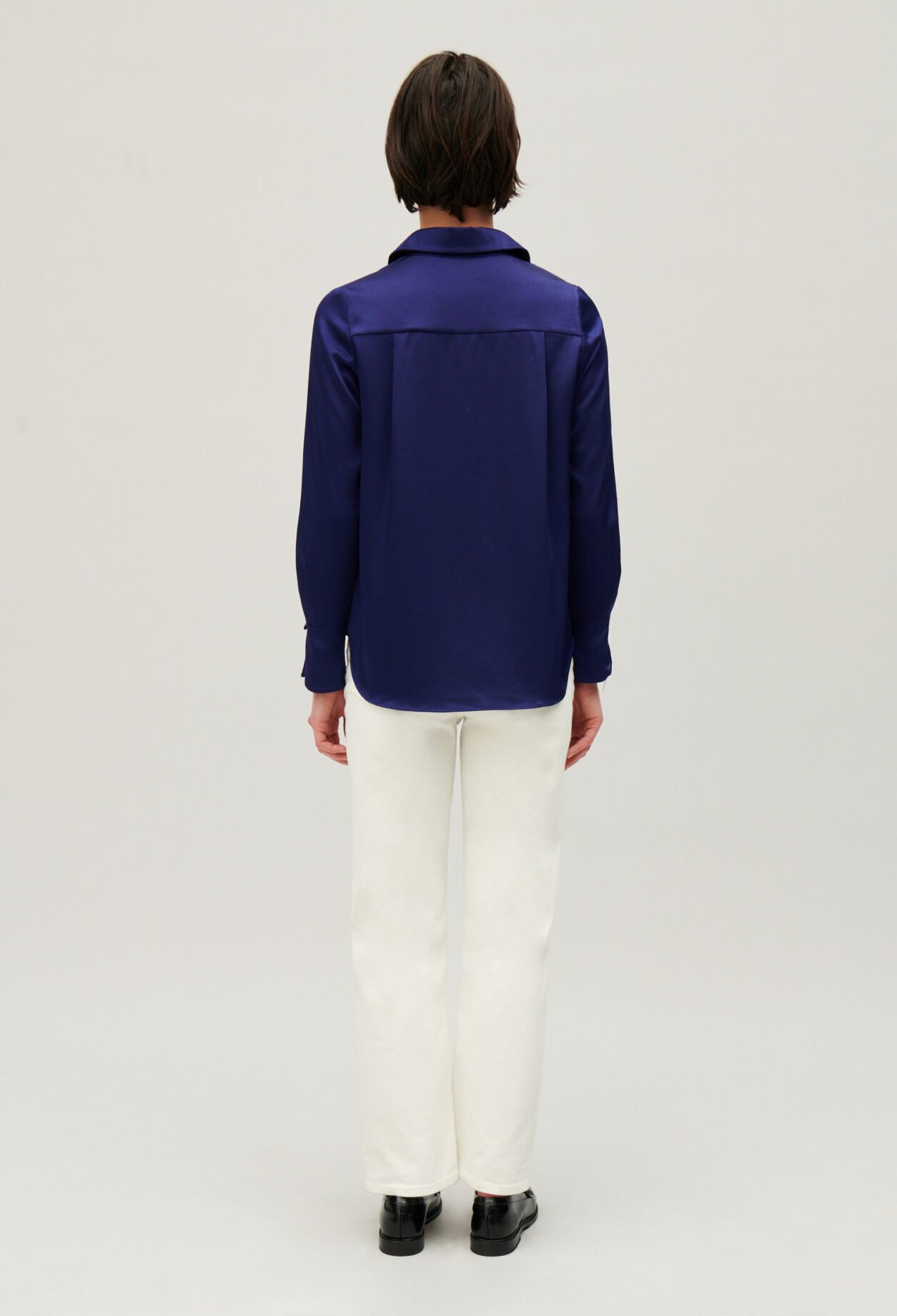 Fließende, plissierte Bluse