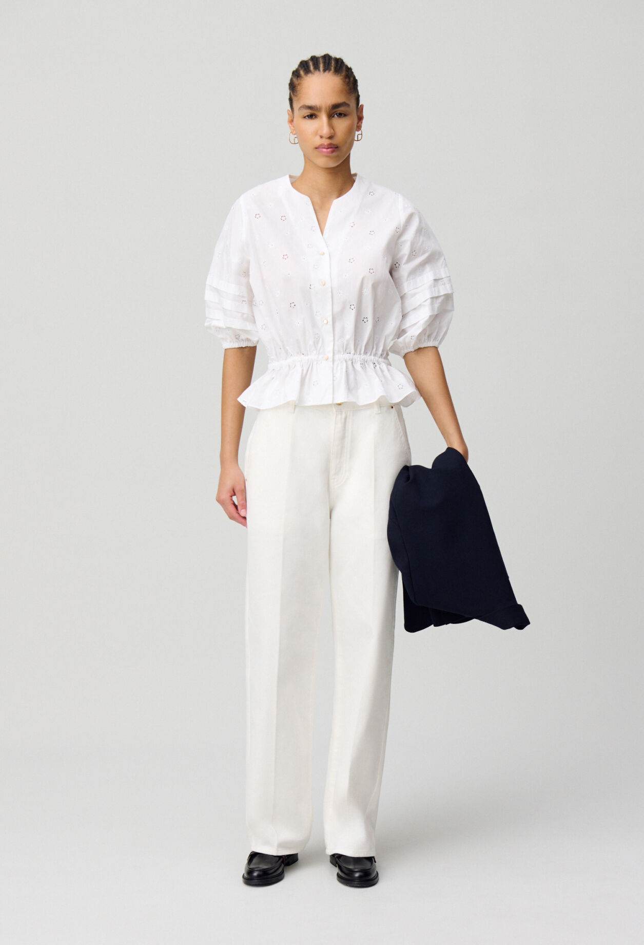 Elastische bestickte Bluse