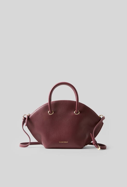 Glattledertasche mit Goldringen