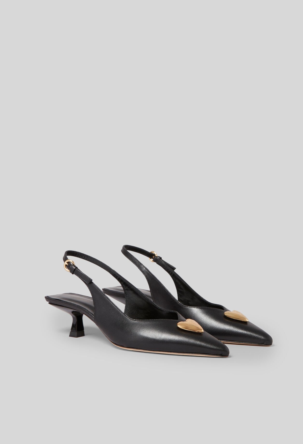 Pumps mit goldenem Herz