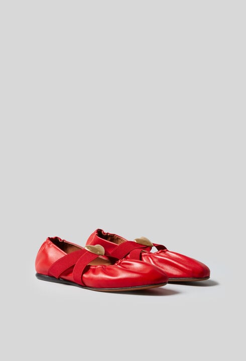 Ballerinas goldener Lederherz
