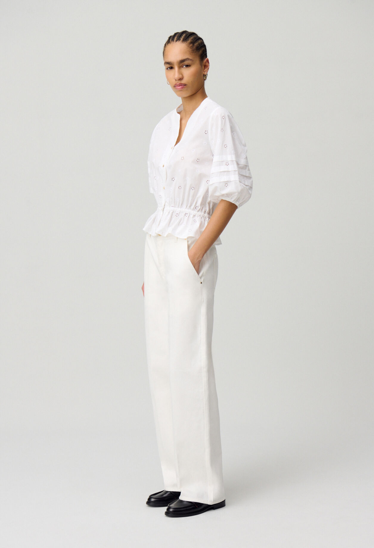 Elastische bestickte Bluse