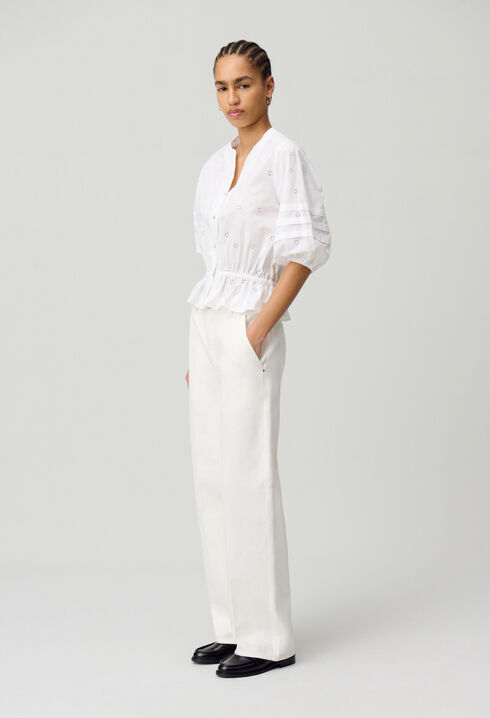 Elastische bestickte Bluse