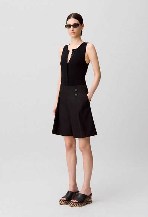 Schwarzer Body aus Strick 