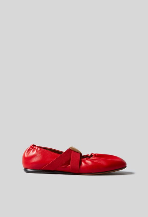 Ballerinas goldener Lederherz
