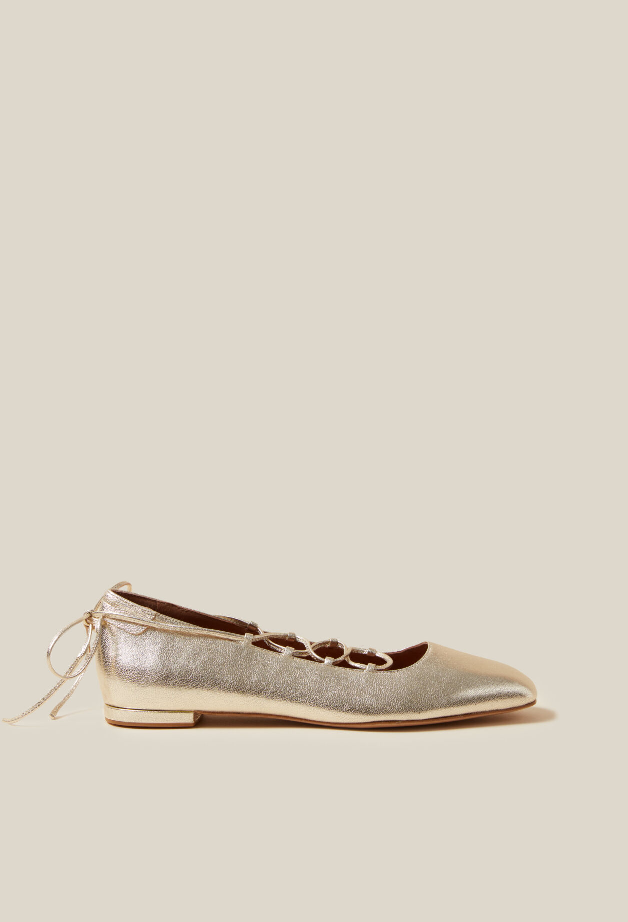 Goldfarbene Leder-Ballerinas