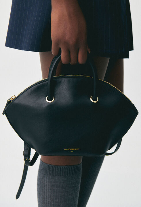 Glattledertasche mit Goldringen