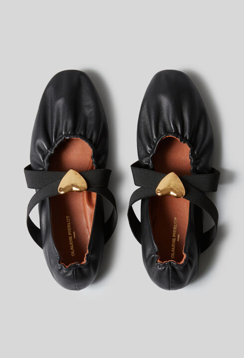 Ballerinas goldener Lederherz