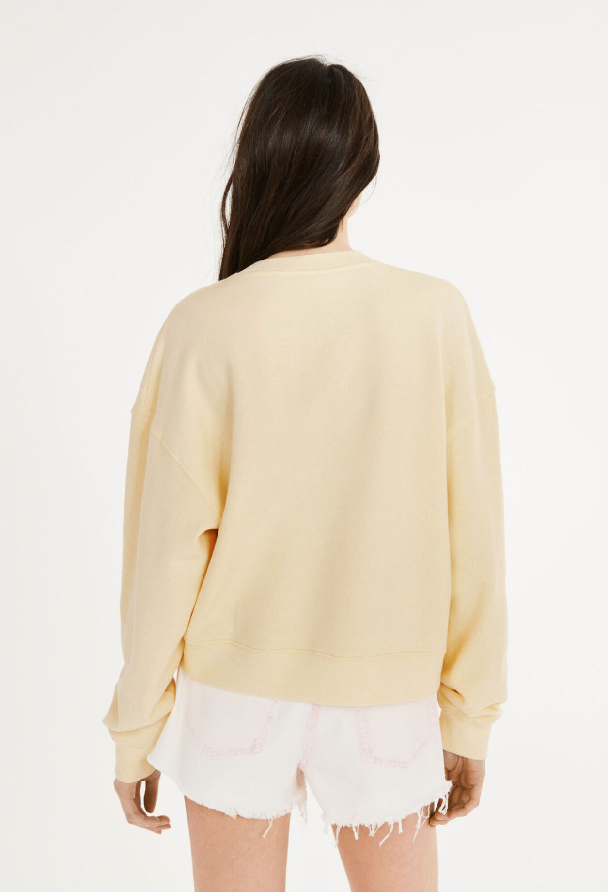 Blassgelbes Sweatshirt