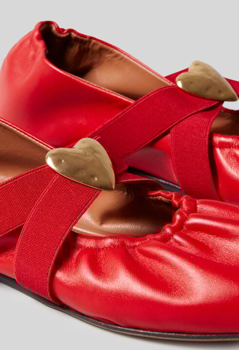 Ballerinas goldener Lederherz
