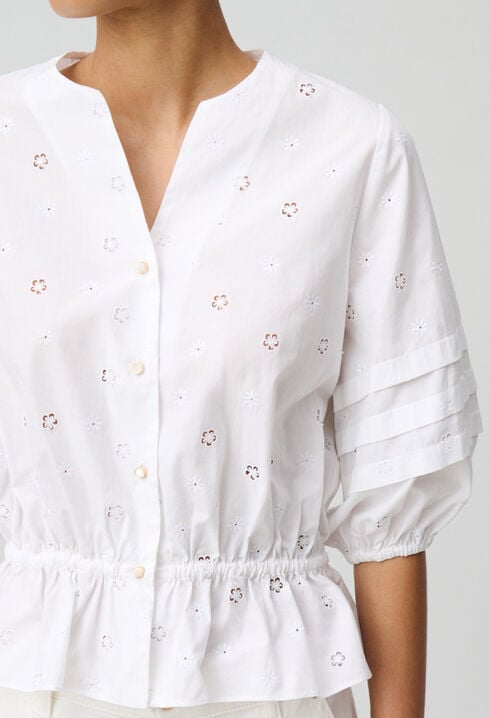 Elastische bestickte Bluse