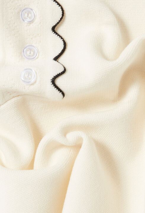 Top aus ecrufarbenem Strick