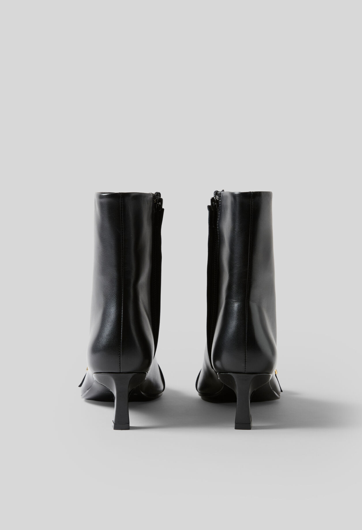 Lederstiefeletten mit Goldschnalle