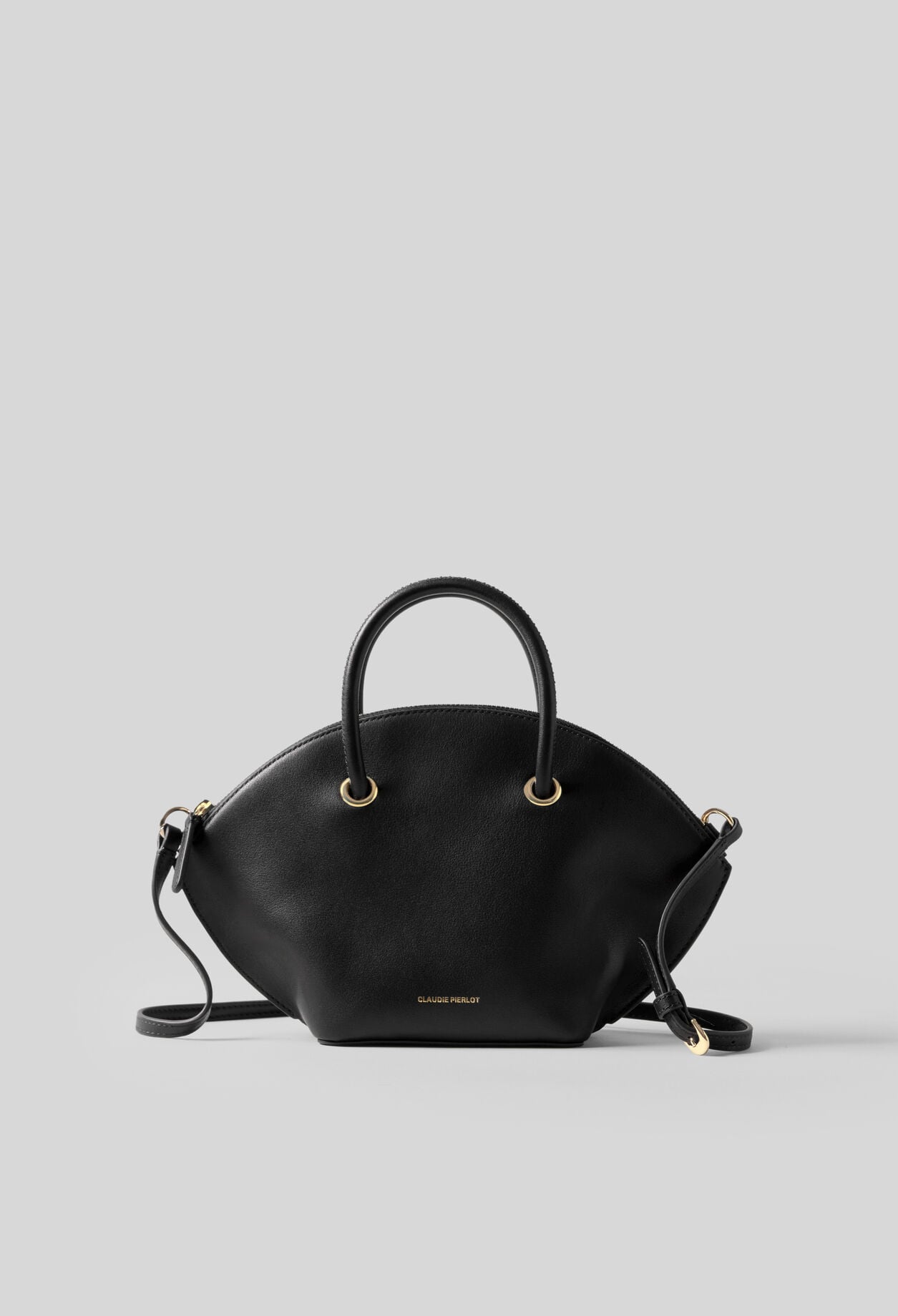 Glattledertasche mit Goldringen