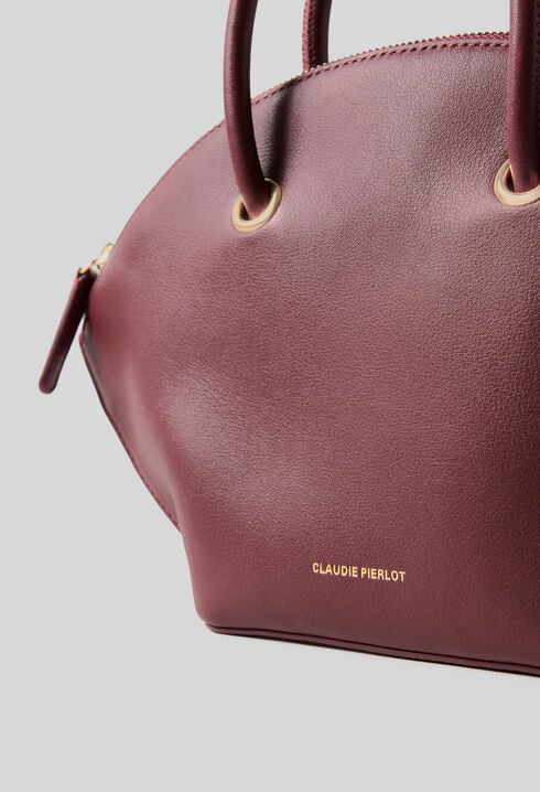 Glattledertasche mit Goldringen