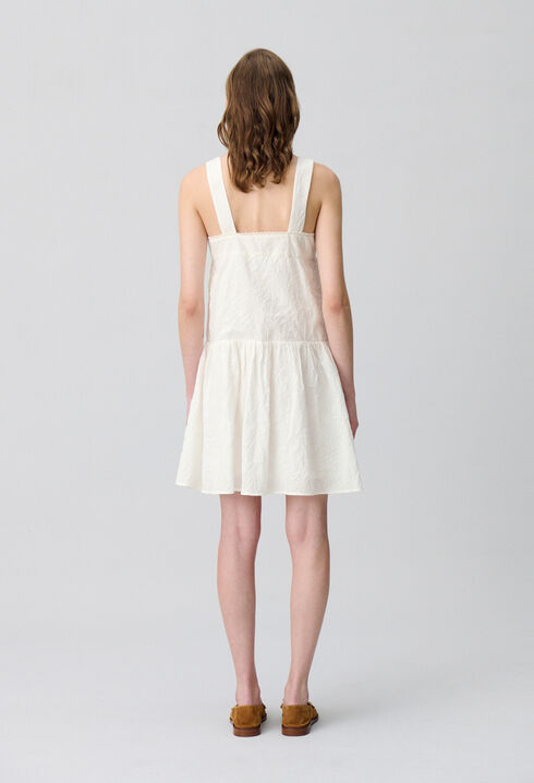 Kurzes Kleid besticktem Oberteil