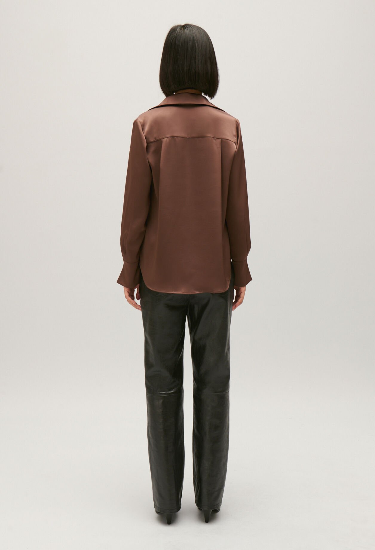 Fließende, plissierte Bluse