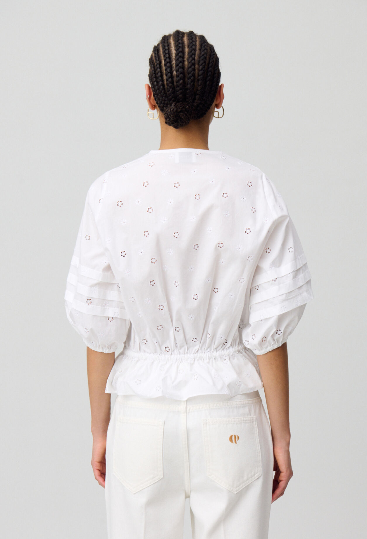 Elastische bestickte Bluse