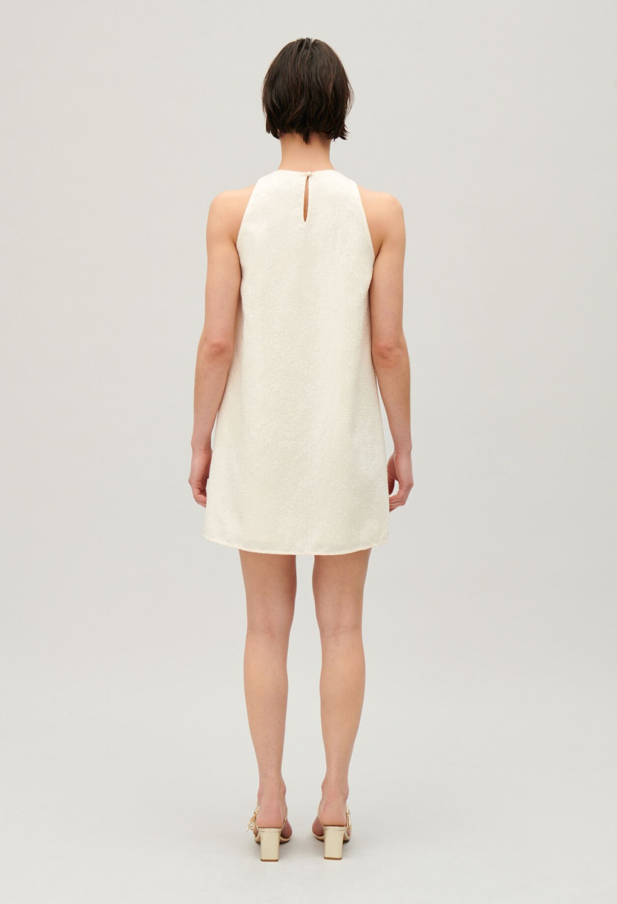 Kurzes, paillettiertes Kleid Ecru