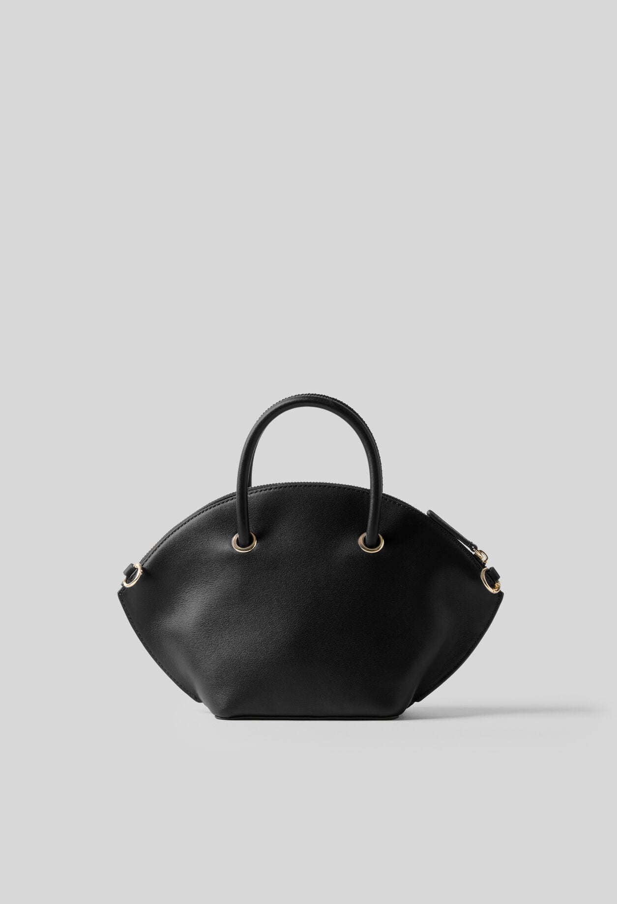 Glattledertasche mit Goldringen